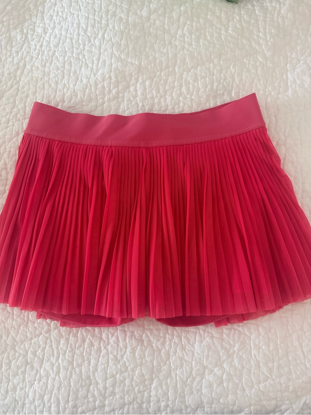 Set of 2 lululemon tennis skirts with built in shorts.